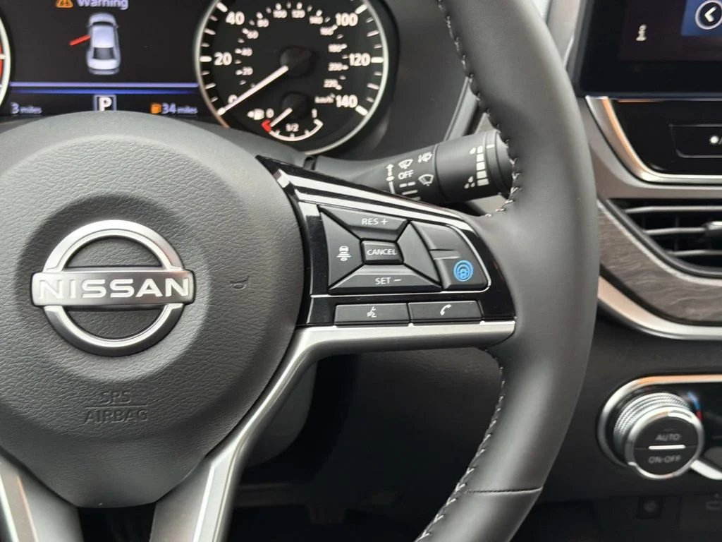 New 2026 Gun Metallic Nissan SV image 12