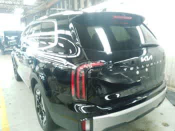 Used 2024 Ebony Black Kia EX image 4
