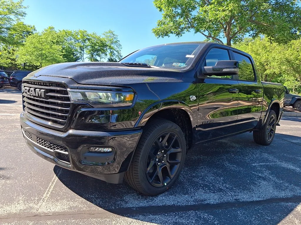 New 2026 Diamond Black Crystal Pearl-Coat Exterior Paint RAM Laramie image 2