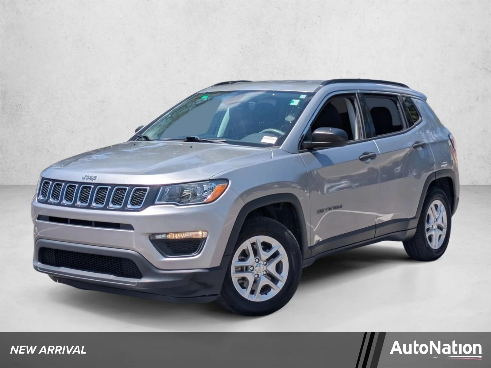 Used 2020 Billet Silver Metallic Clearcoat Jeep Sport image 1