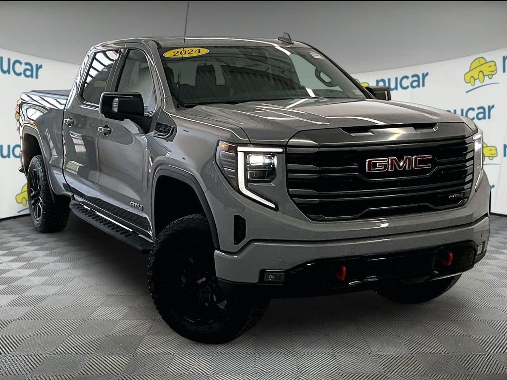 Used 2024 Thunderstorm Gray GMC AT4 image 1