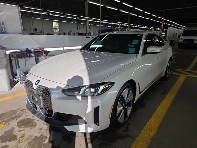 Used 2025 White BMW xDrive40 image 1