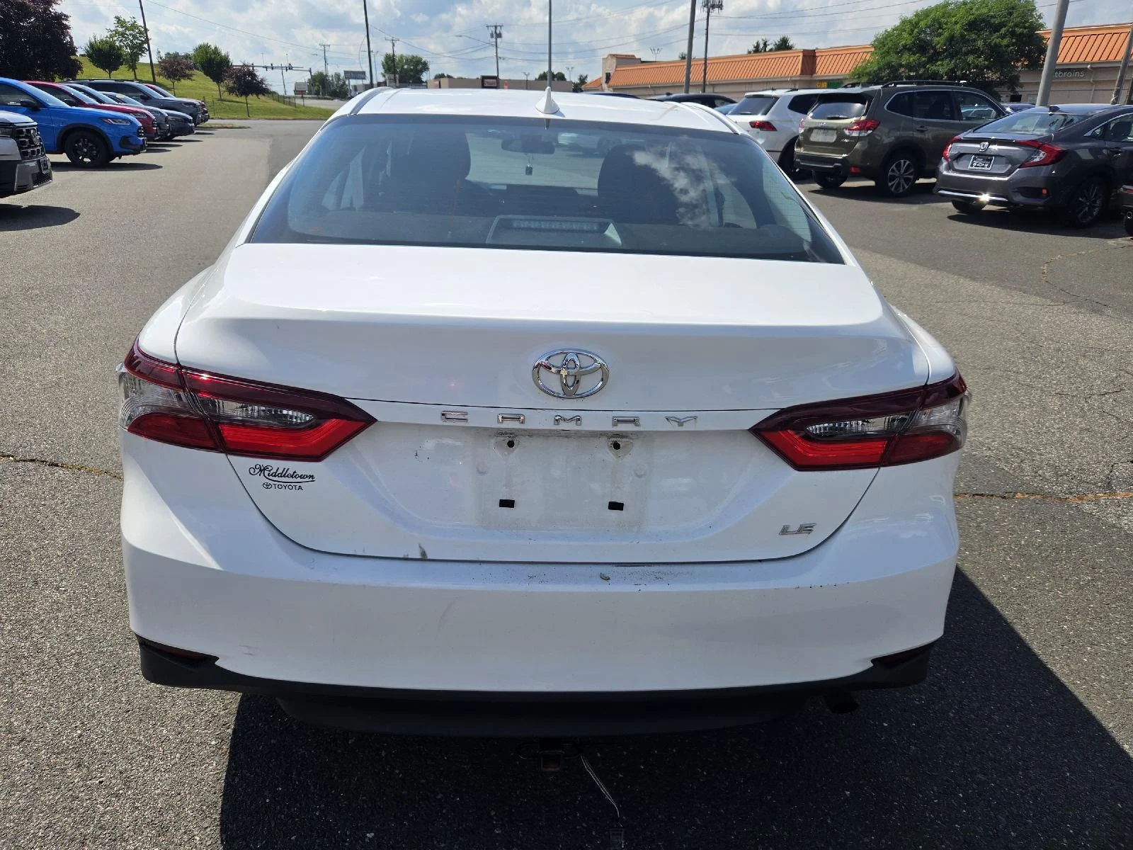 Used 2022 Super White Toyota LE image 4