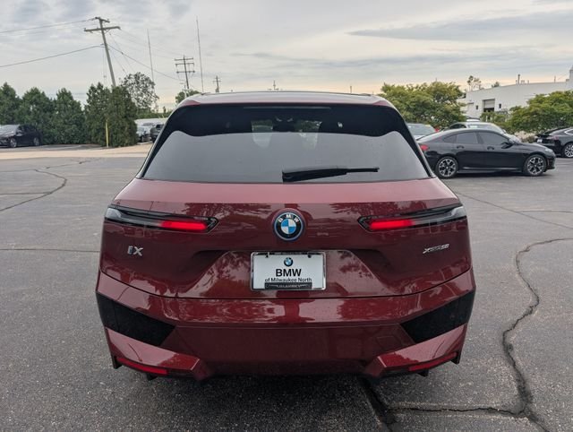 Certified Used 2024 Aventurin Red Metallic BMW xDrive50 image 3