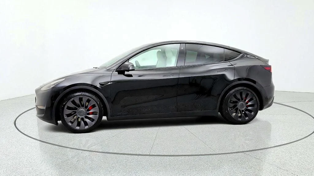 Used 2021 Solid Black Tesla Performance AWD w/ White & Black Premium Interior image 8