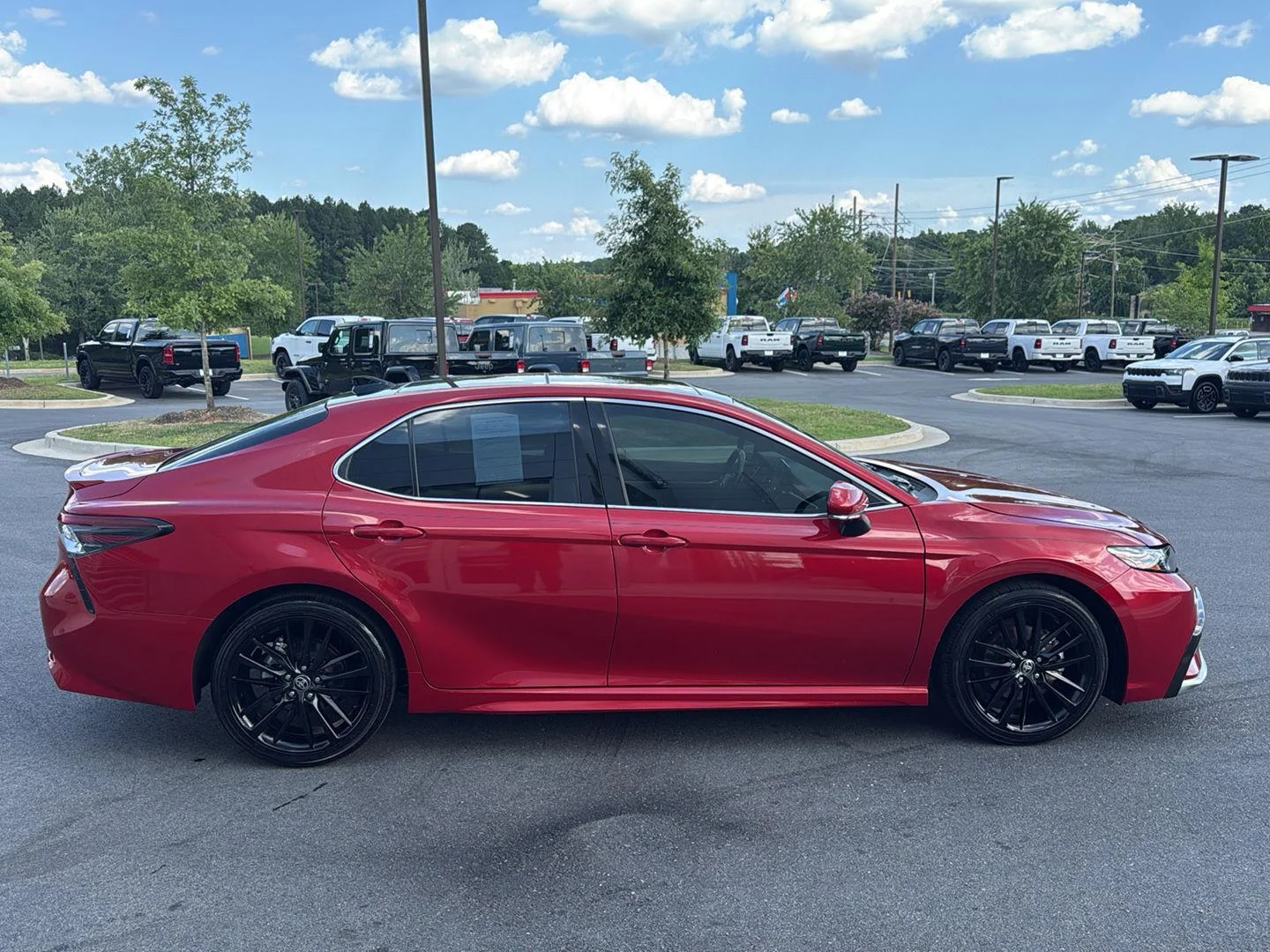 Used 2024 Supersonic Red Toyota XSE V6 image 5