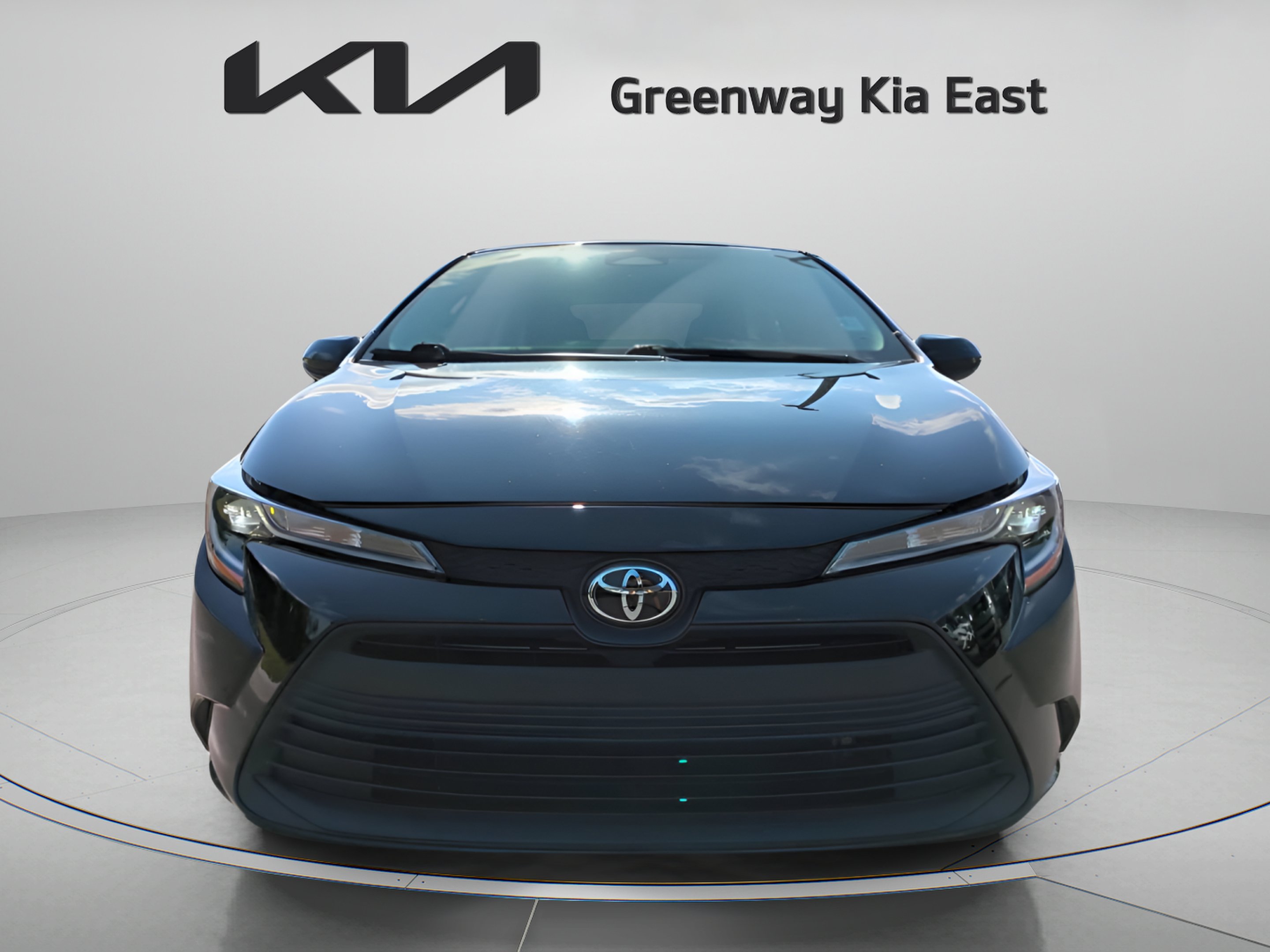 Used 2024 Midnight Black Metallic Toyota LE image 4