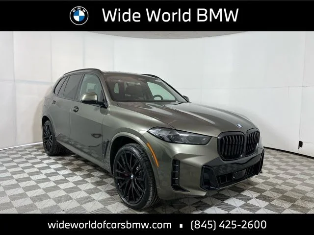 Used 2026 Manhattan Green Metallic BMW xDrive40i image 1