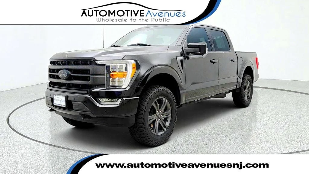 Used 2023 Agate Black Metallic Ford LARIAT 4WD SuperCrew 5.5