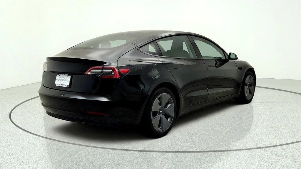 Used 2023 Solid Black Tesla RWD image 5