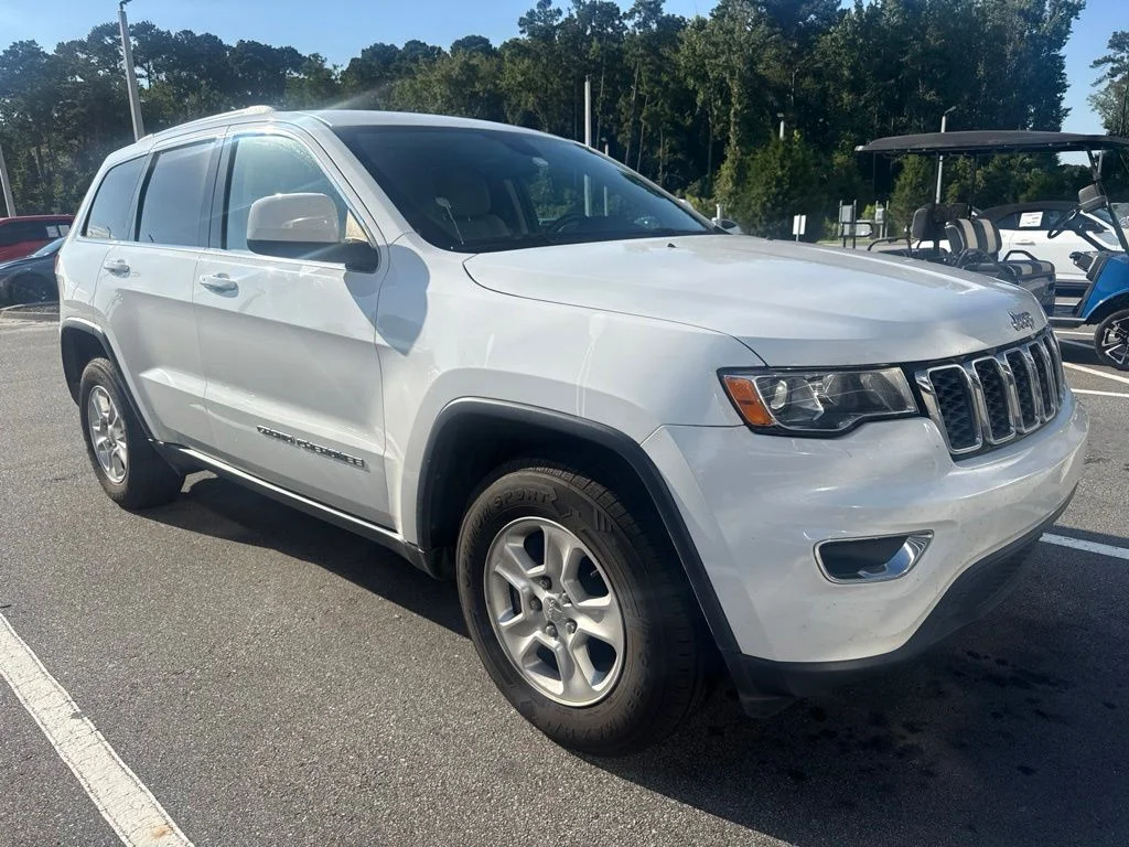 Used 2017 Bright White Clearcoat Jeep Laredo image 1