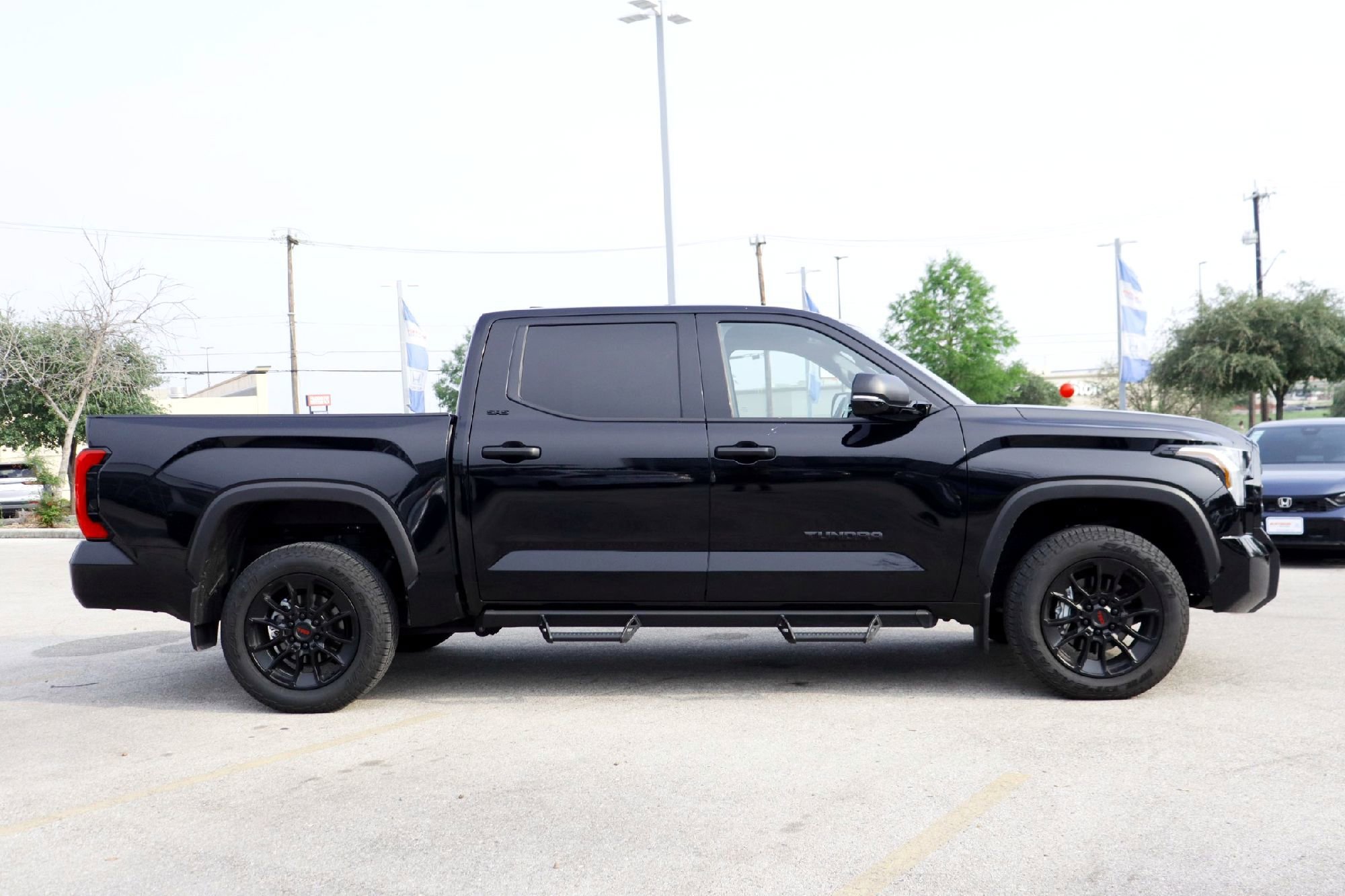 Used 2025 Midnight Black Metallic Toyota SR5 image 4