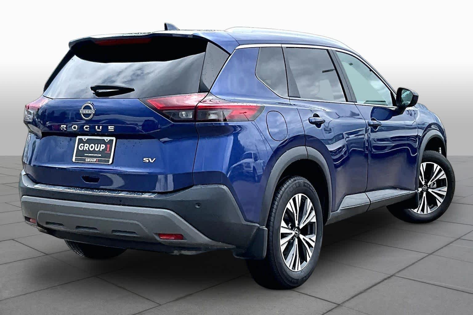 Used 2023 Caspian Blue Metallic Nissan SV image 12