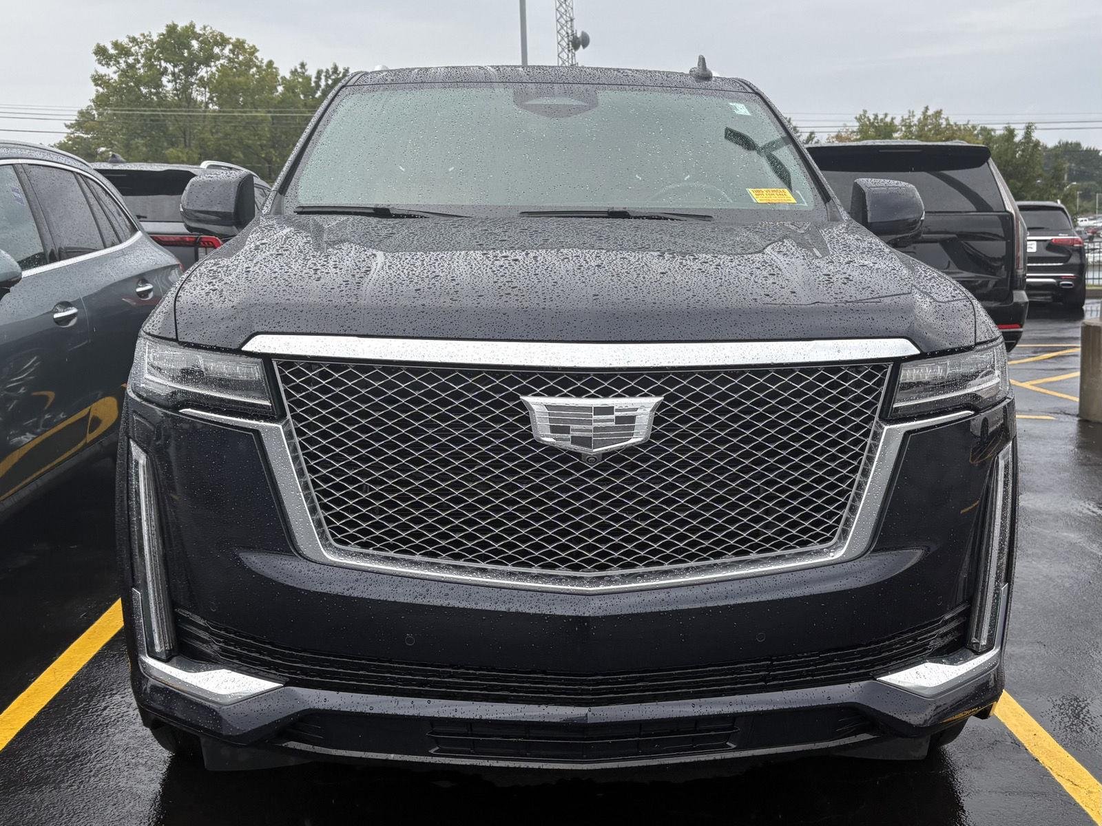 Used 2022 Dark Moon Blue Metallic Cadillac Premium Luxury image 2
