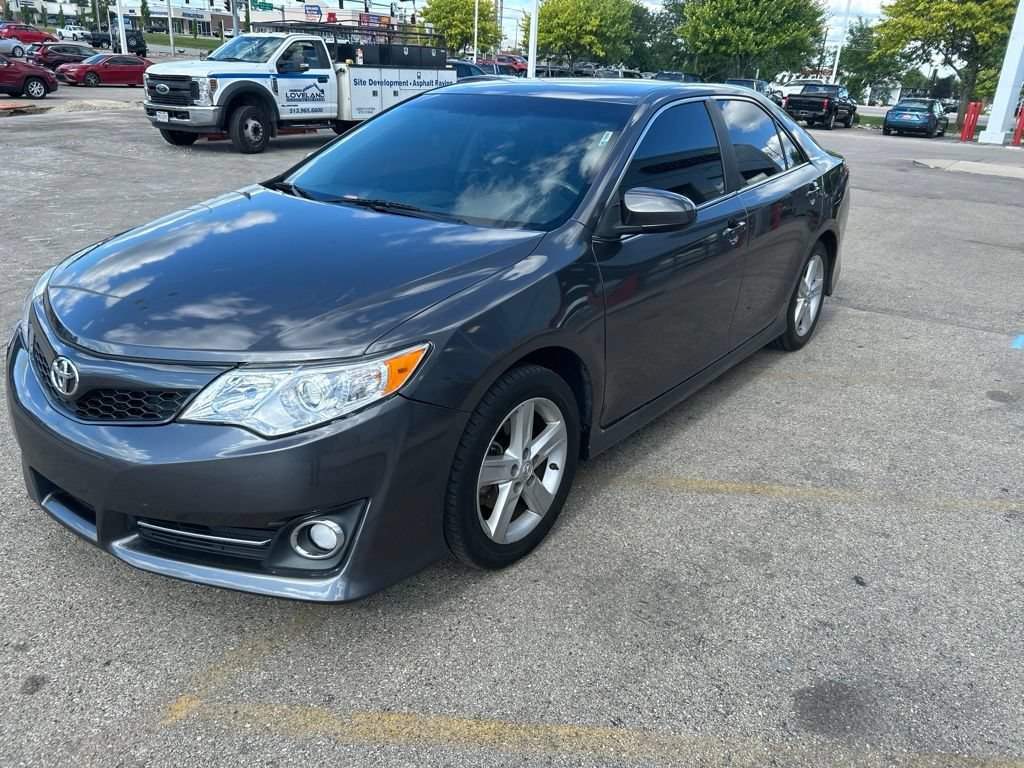Used 2014 Magnetic Gray Metallic Toyota SE image 1