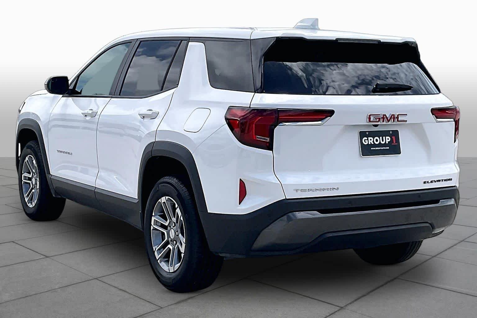 Used 2026 Summit White GMC FWD Elevation image 11