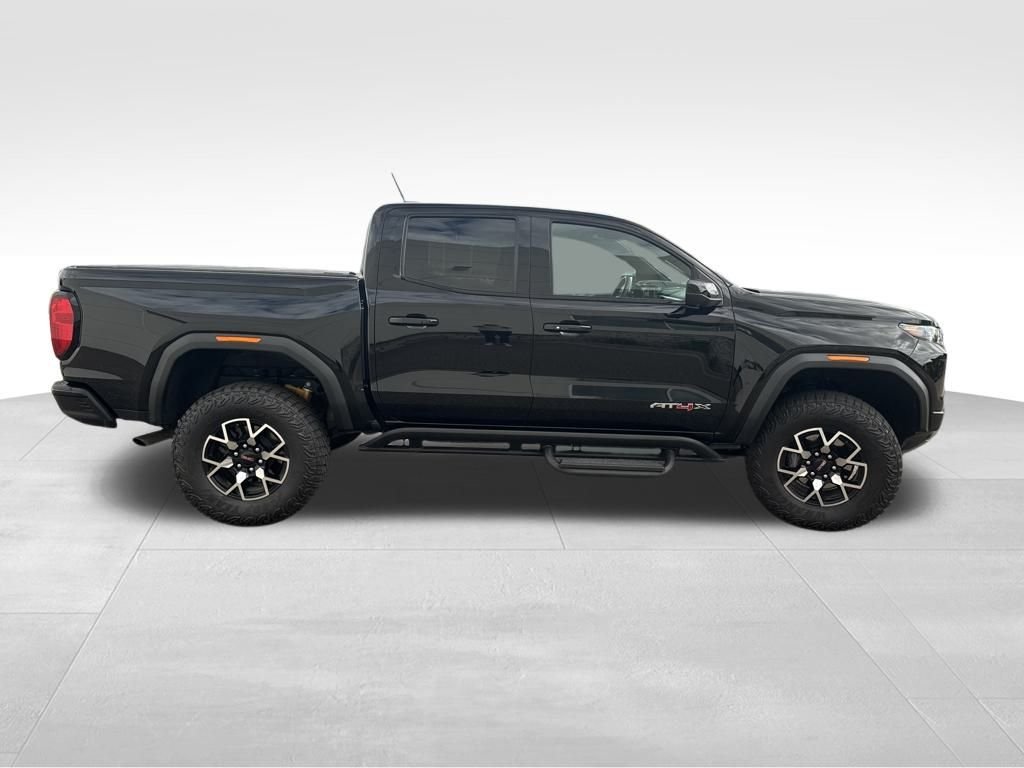 Used 2024 GMC Canyon AT4X with VIN 1GTP6EEK1R1296898 for sale in Coon Rapids, Minnesota