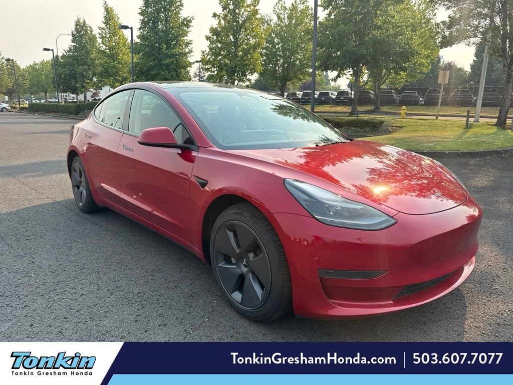 Used 2023 Red Multi-Coat Tesla Base image 1