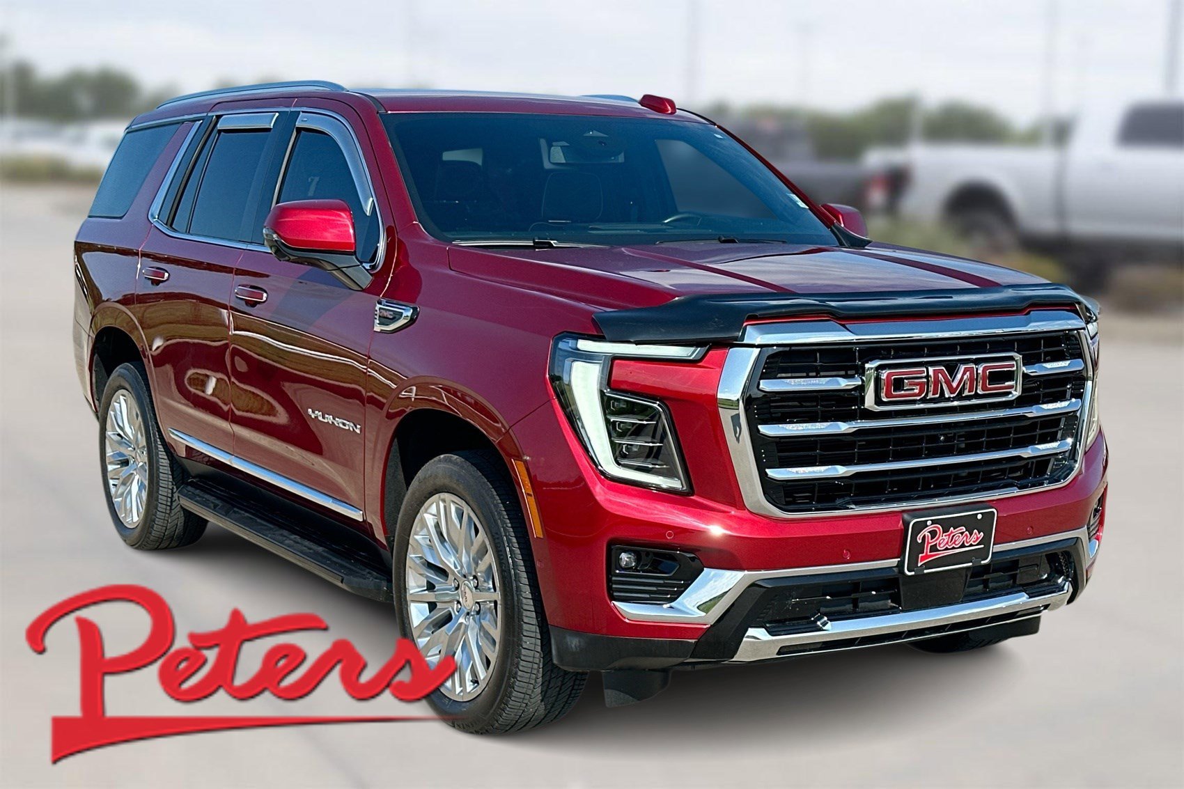 Used 2025 Volcanic Red Tintcoat GMC Elevation image 1