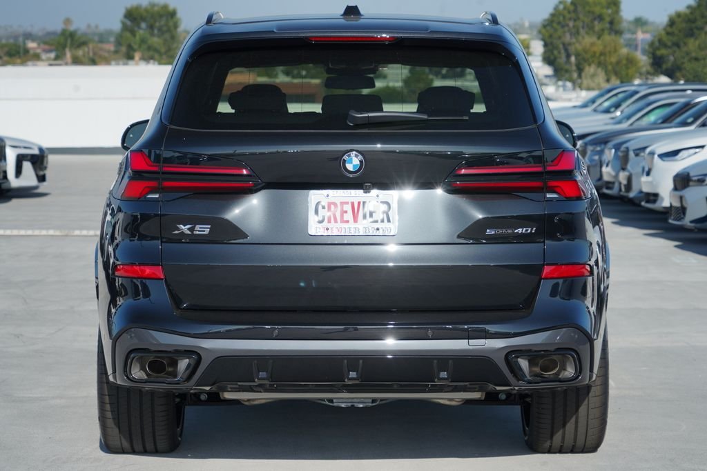 New 2026 Black Sapphire Metallic BMW sDrive40i image 6