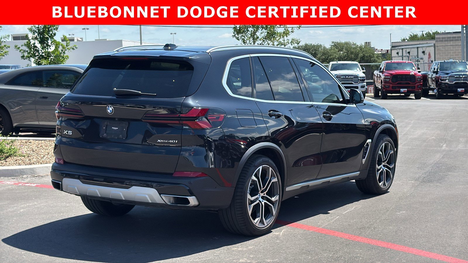 Certified Used 2024 Black Sapphire Metallic BMW xDrive40i image 5