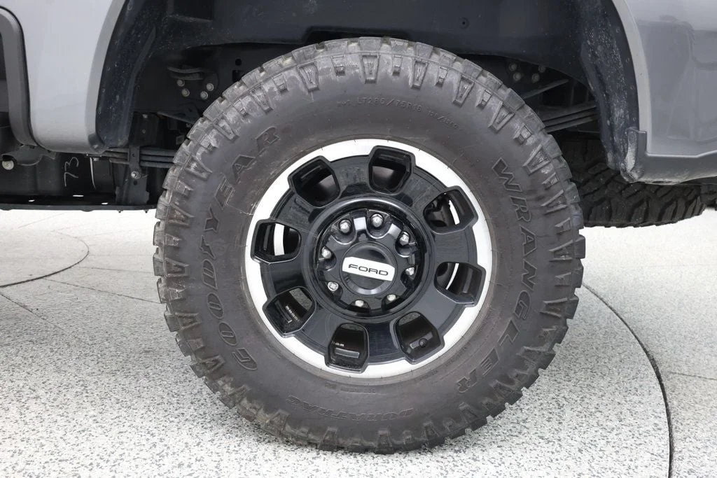 Used 2025 Carbonized Gray Metallic Ford XLT 4WD Crew Cab 6.75