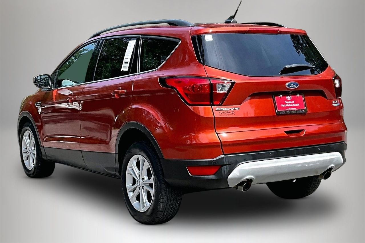 Used 2019 Orange Ford SEL image 4