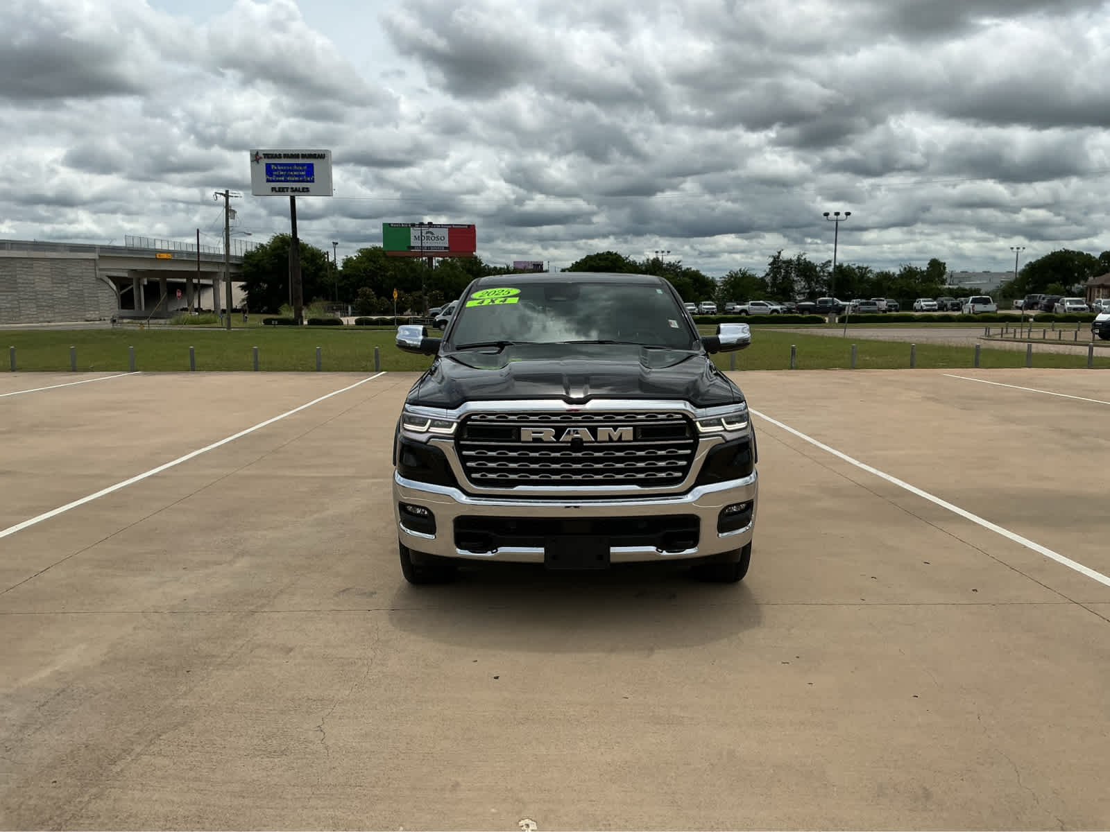 Used 2025 Diamond Black Crystal Pearlcoat Ram Limited image 3