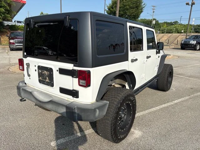 Used 2017 White Jeep Unlimited Sport image 4