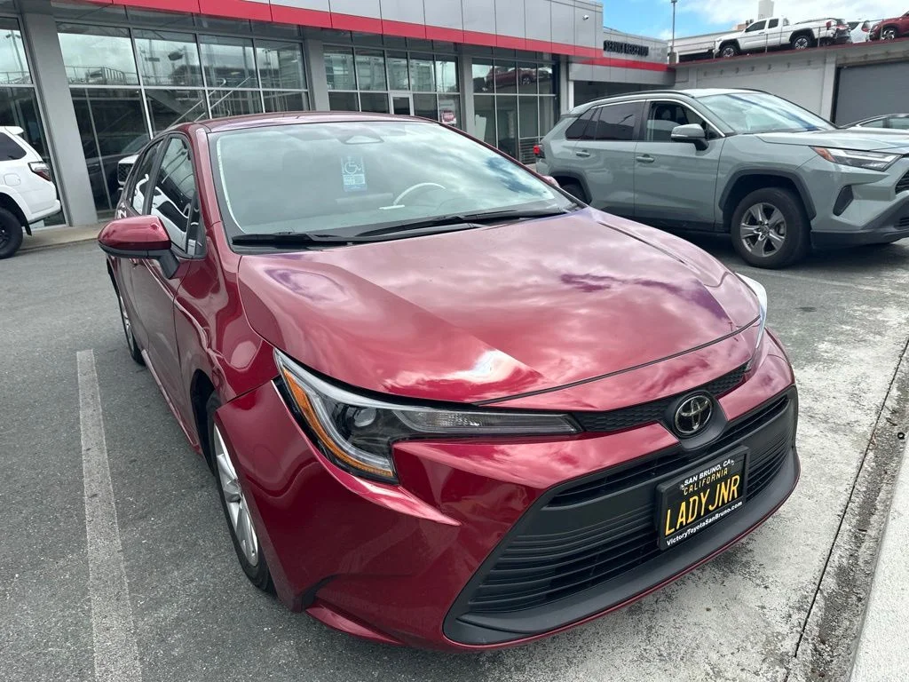 Used 2024 Red Toyota LE image 6