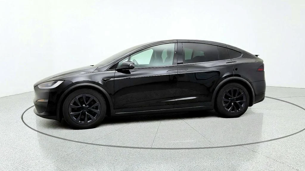 Used 2023 Solid Black Tesla AWD image 8
