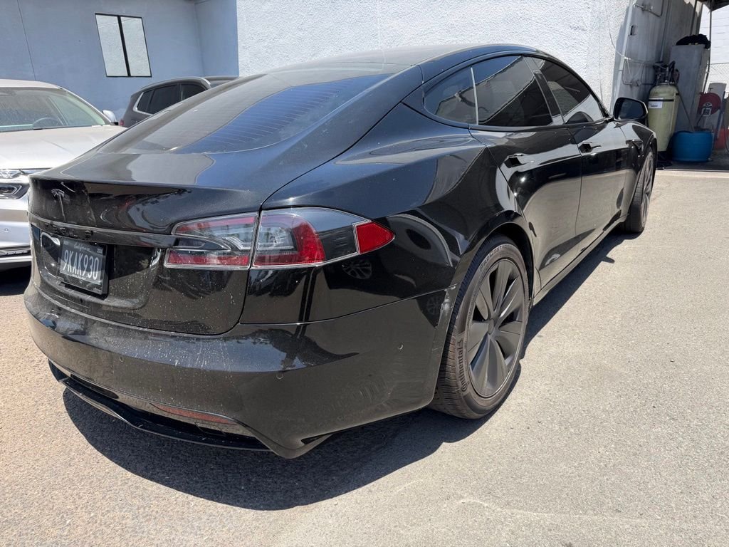 Used 2022 Solid Black Tesla Base image 7