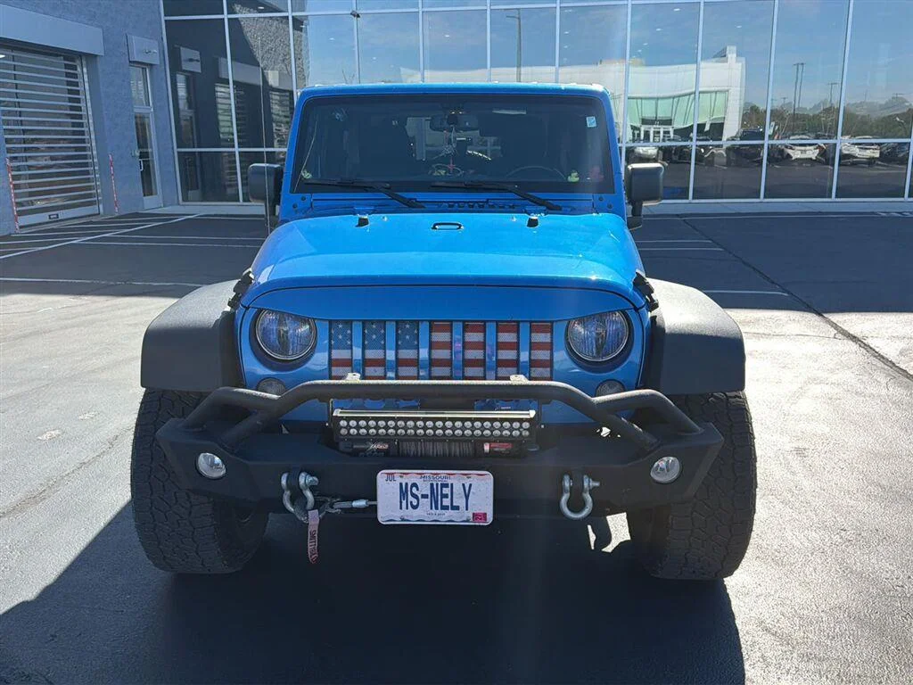 Used 2015 Hydro Blue Pearl Coat Jeep Sport image 3