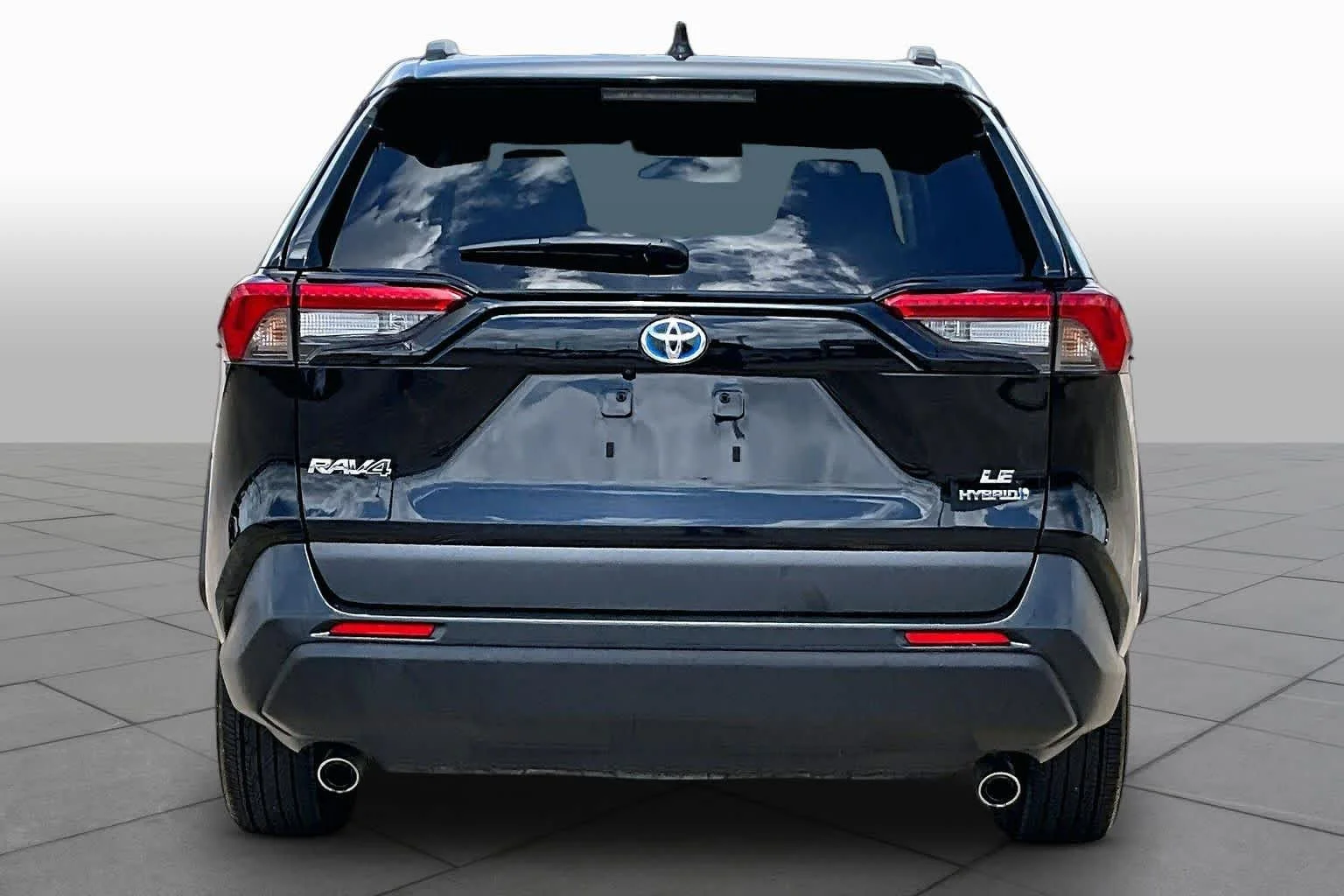 Used 2024 Midnight Black Metallic Toyota Hybrid LE image 5