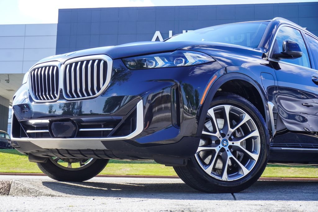 Used 2025 Black BMW xDrive50e image 2