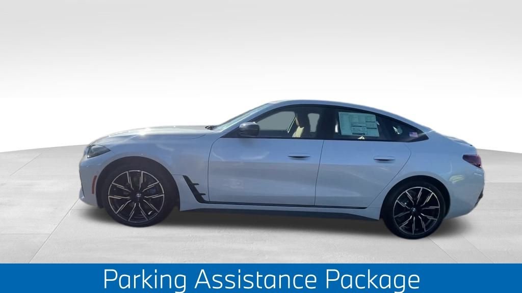 Certified Used 2025 Mineral White Metallic BMW eDrive40 image 9