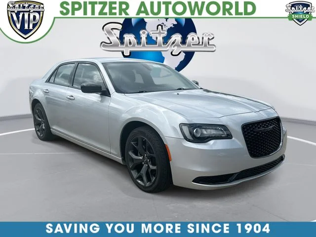 Used 2023 Silver Chrysler Touring image 1