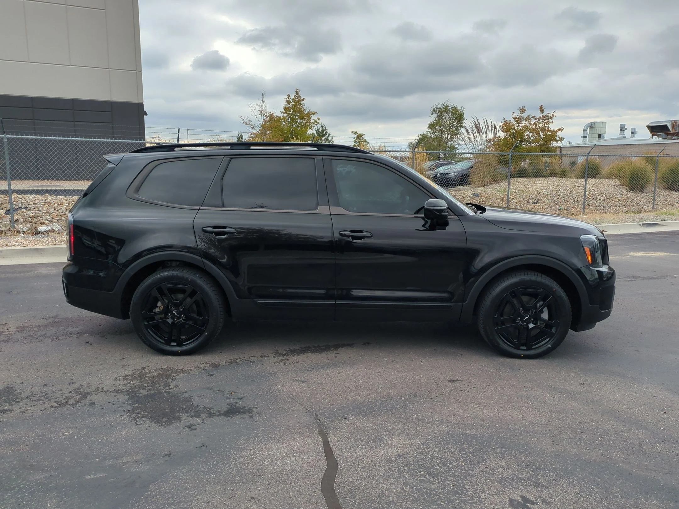 Used 2024 Ebony Black Kia SX Prestige X-Line image 6