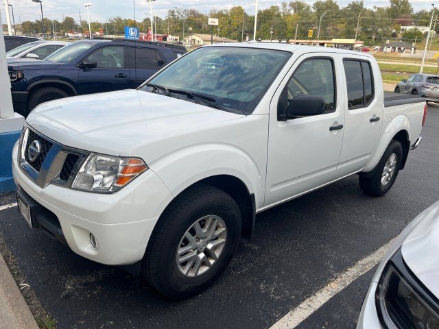 Used 2017 Glacier White Nissan S image 1