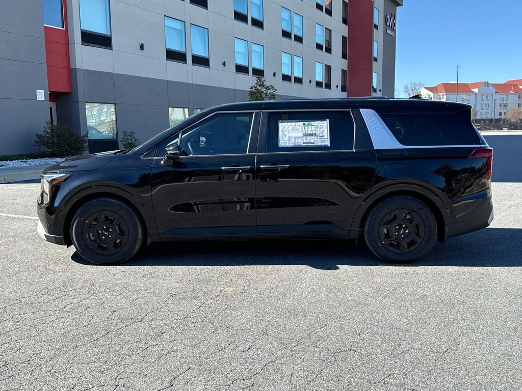 New 2026 Black Kia LXS image 4