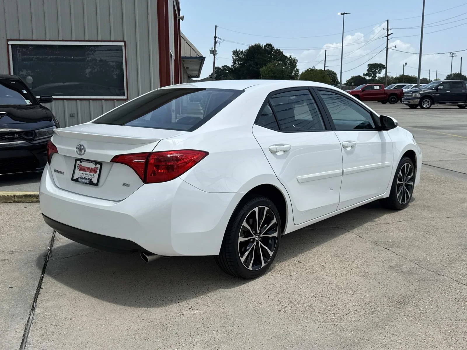 Used 2019 Super White Toyota LE image 7