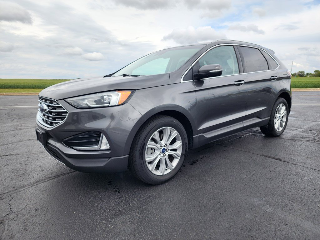 Used 2019 Magnetic Metallic Ford Titanium image 1