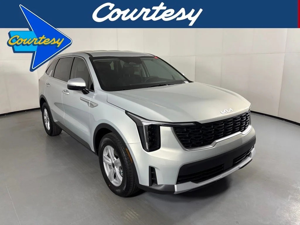 New 2026 Ivory Silver Kia LX image 1