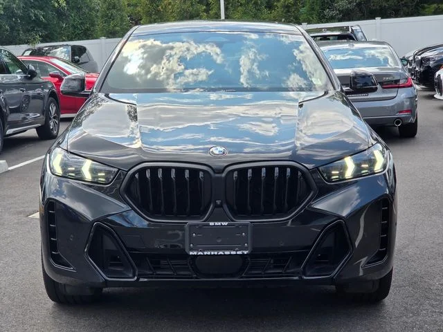 Certified Used 2024 Black Sapphire Metallic BMW xDrive40i image 2