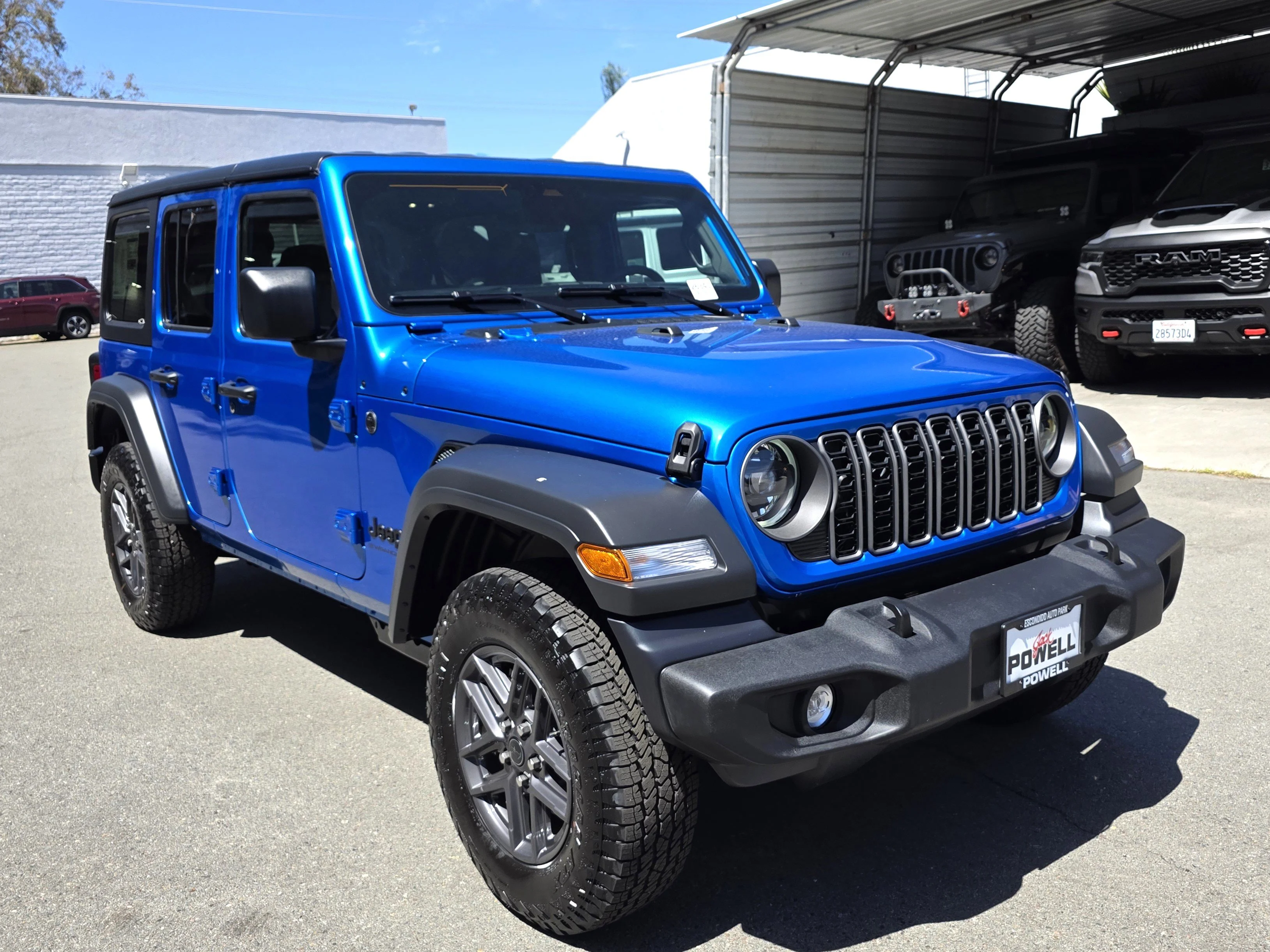New 2026 Blue Pearl Jeep Sport S image 6