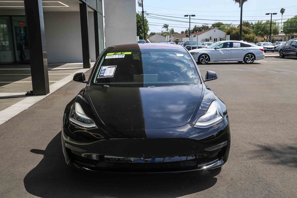 Used 2019 Tesla Model 3 Mid Range with VIN 5YJ3E1EAXKF310716 for sale in Downey, CA