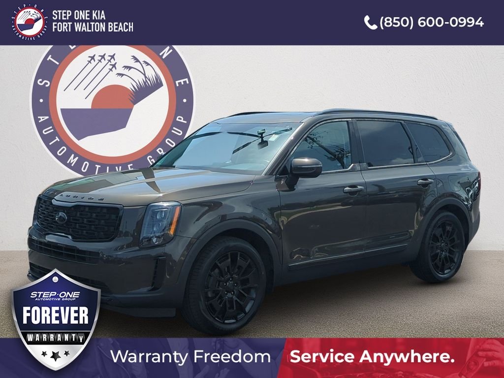 Used 2021 Green Kia EX image 1
