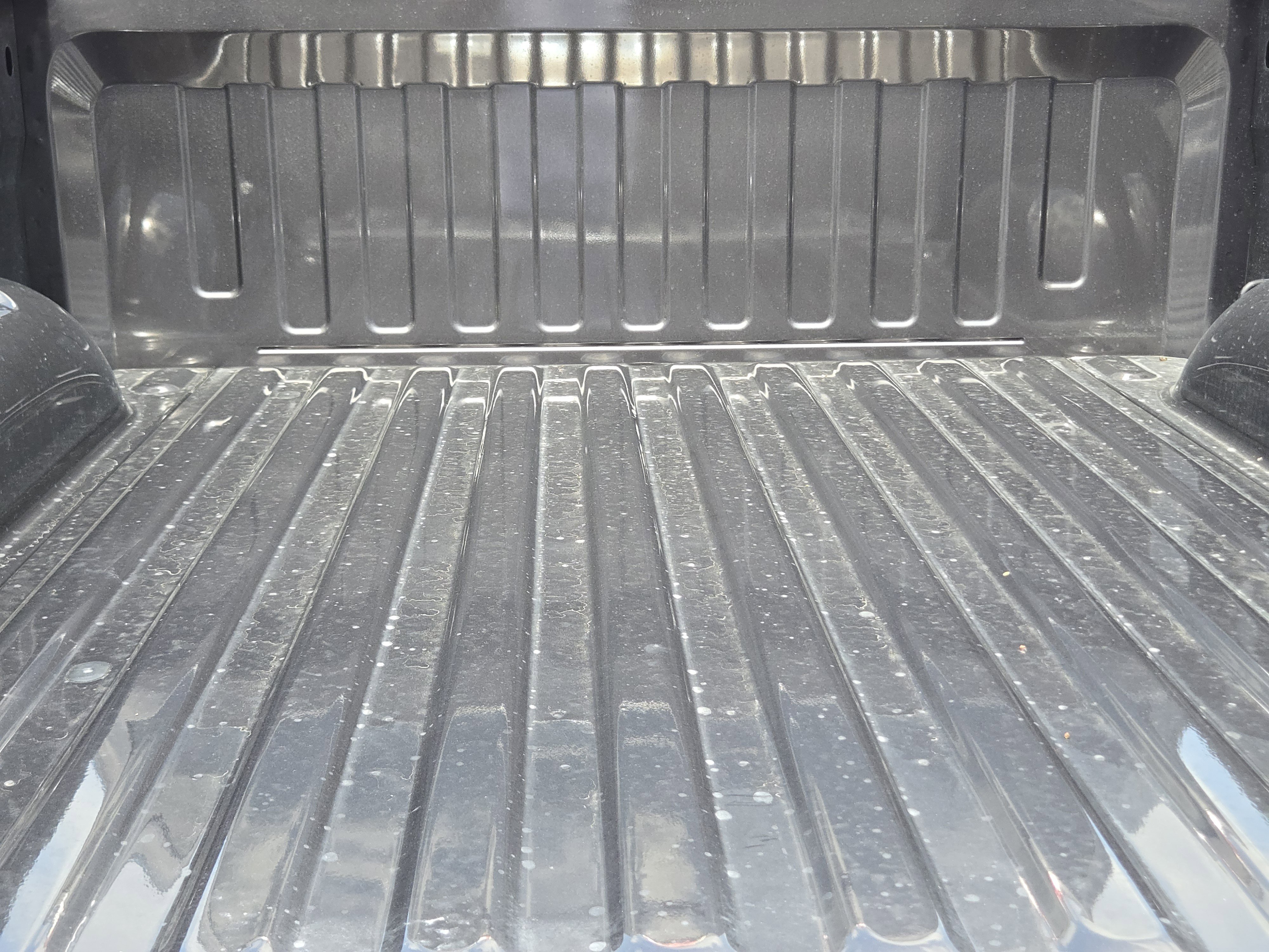 New 2026 Granite Crystal Metallic Clearcoat RAM Lone Star image 23
