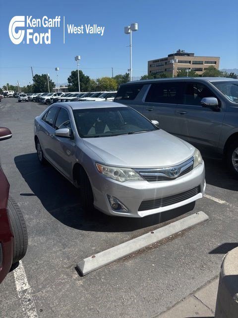 Used 2013 Classic Silver Metallic Toyota LE image 1