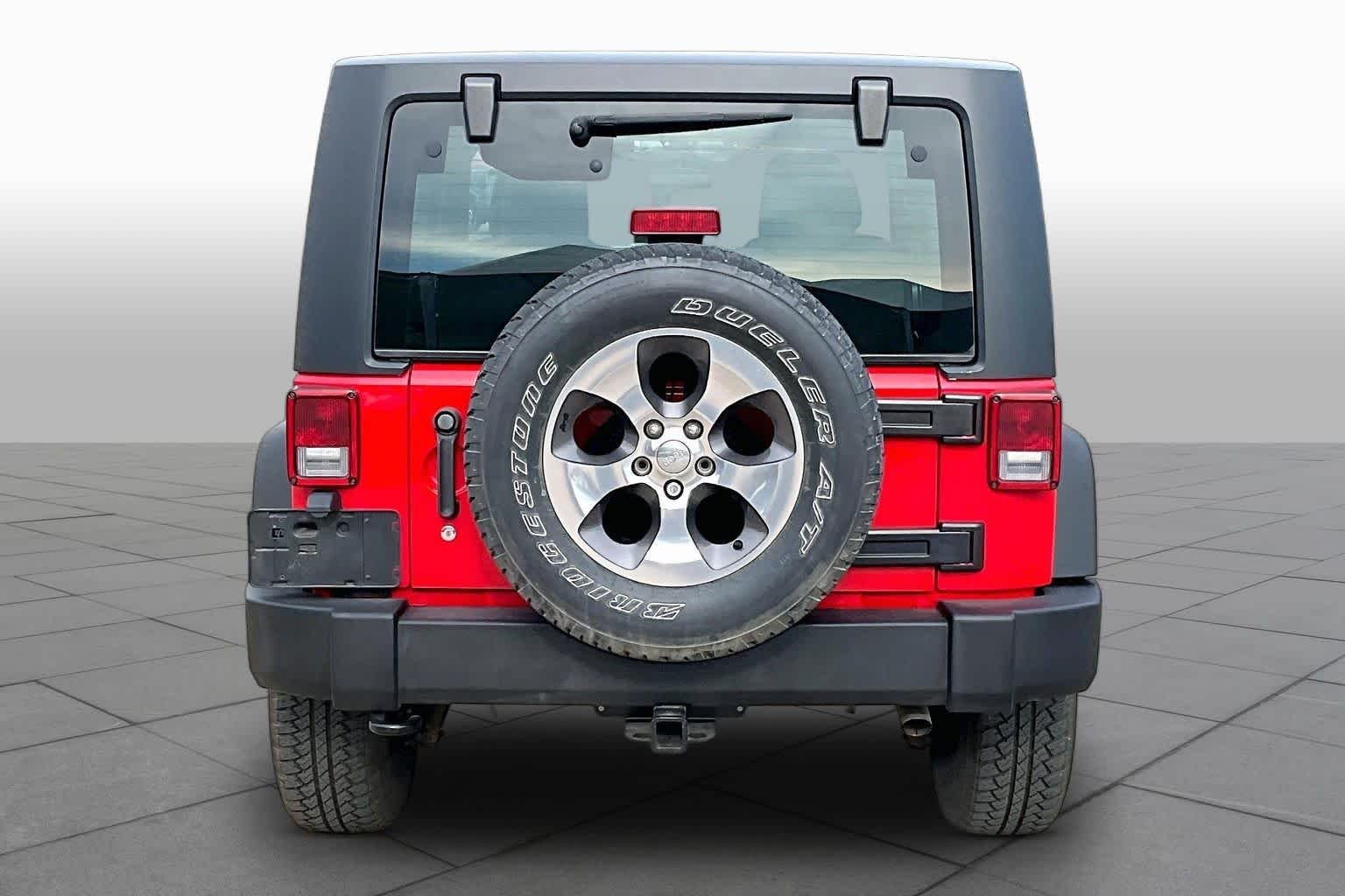 Used 2016 Firecracker Red Clearcoat Jeep Sport image 4
